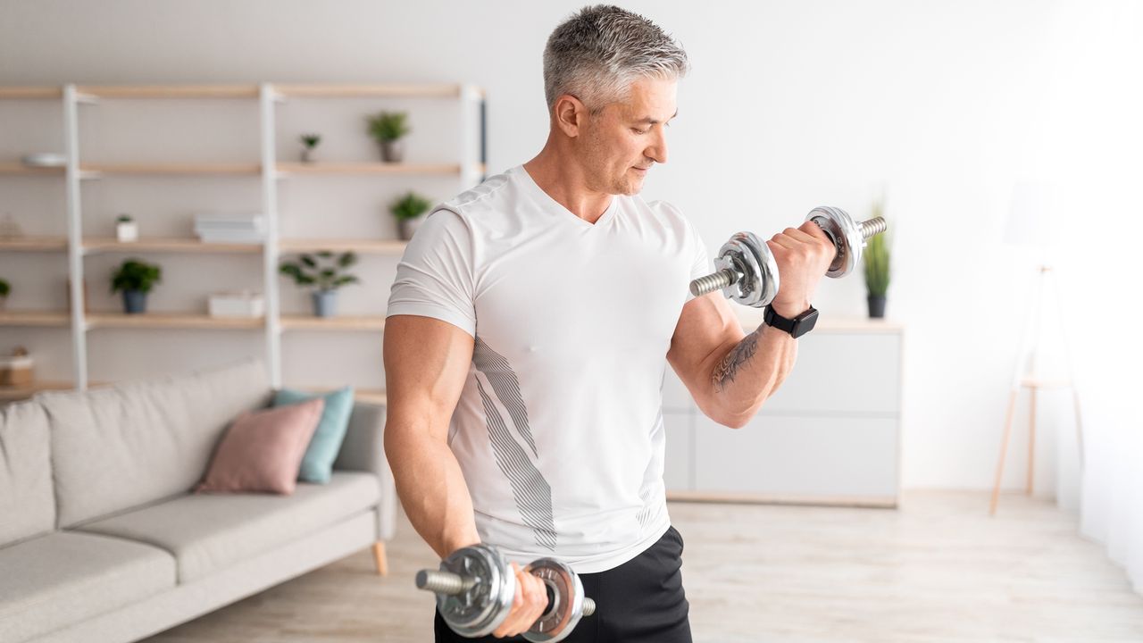 Man exercising with dumbbells