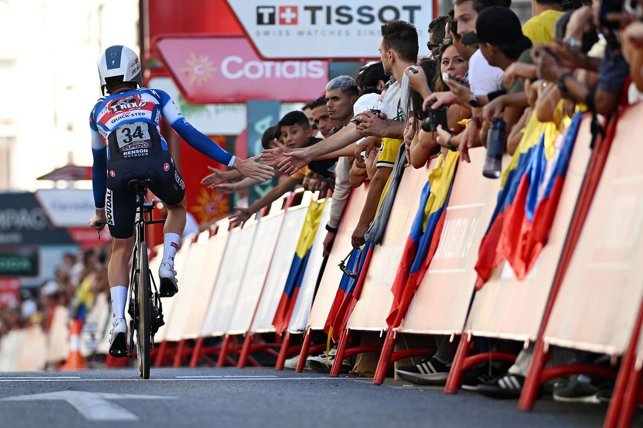 MADRID, SPAIN - SEPTEMBER 08: James Knox of The United Kingdom and Team T-Rex Quick Step waves to the crowd during the La Vuelta - 79th Tour of Spain 2024, Stage 21 a 24.6km individual time trial stage from Madrid to Madrid / #UCIWT / on September 08, 2024 in Madrid, Spain. (Photo by Tim de Waele/Getty Images)