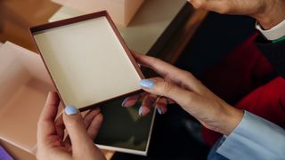 Woman holding a gift box