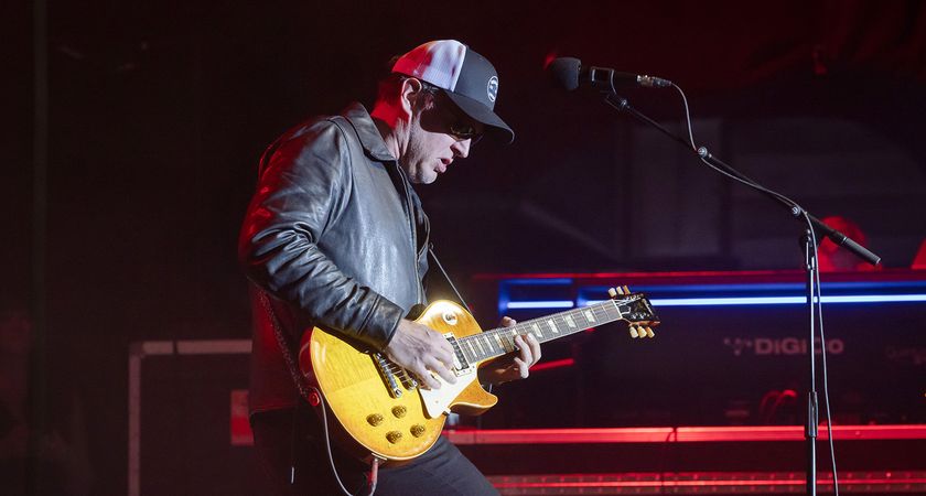 Joe Bonamassa performs with Black Country Communion at a 2025 show in Berlin. He plays a vintage Gibson Les Paul and wears a ballcap.