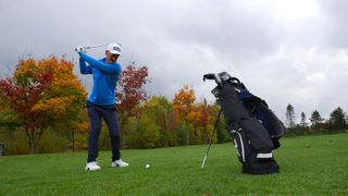 PGA pro Barney Puttick hitting a shot at Essendon Golf Club