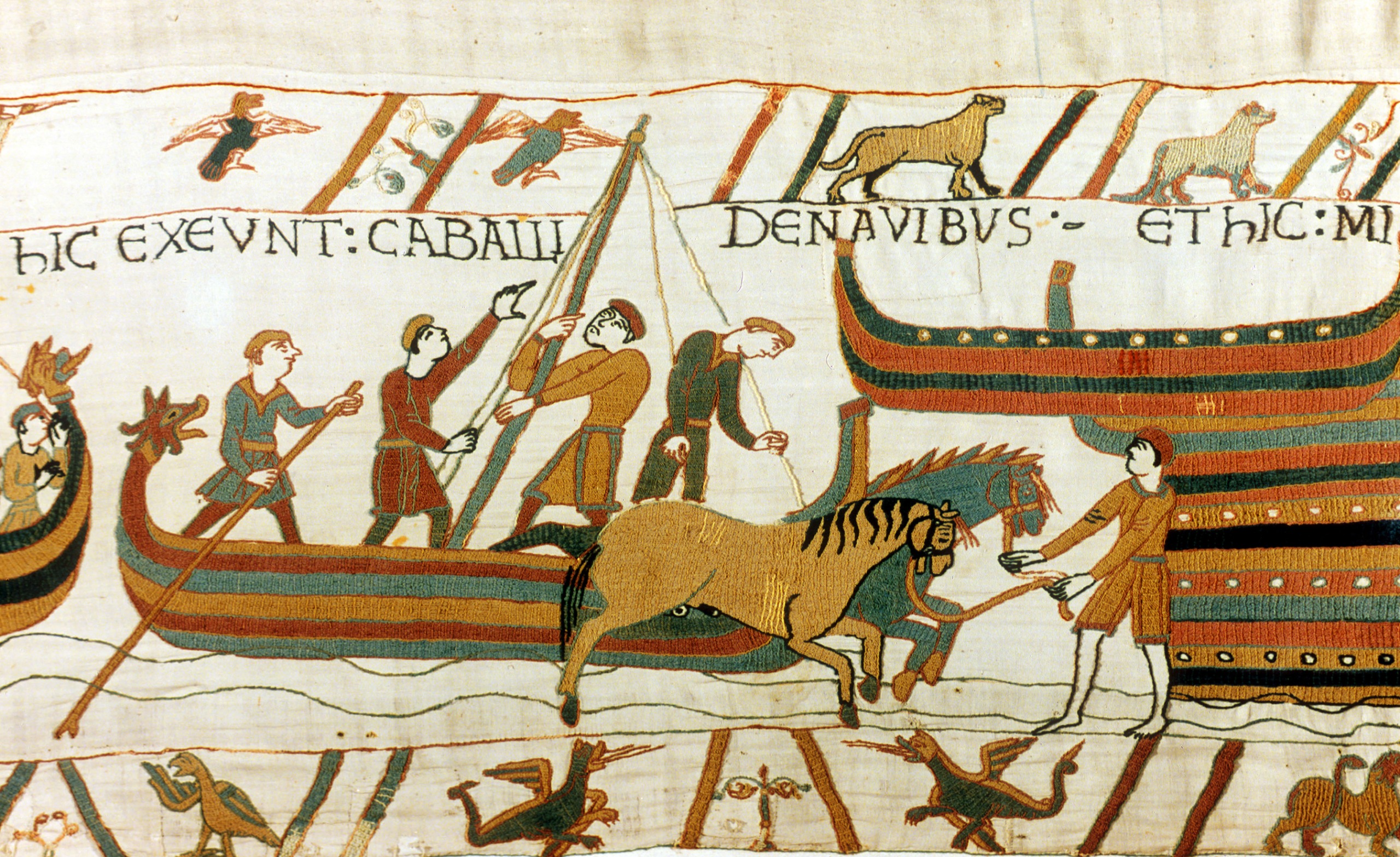 A scene from the Bayeux Tapestry, showing boats, horses and other animals