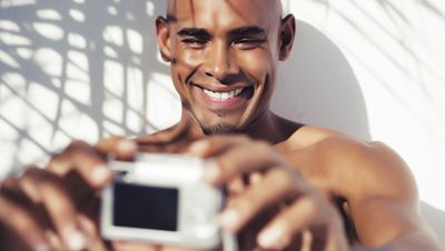 man taking photo of himself