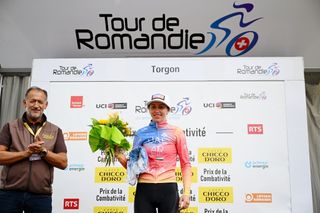 TORGON SWITZERLAND SEPTEMBER 16 Silvia Persico of Italy and UAE Team ADQ celebrates at podium as most combative rider trophy during the 2nd Tour de Romandie Feminin 2023 Stage 2 a 1108km stage from Romont to Torgon 1097m UCIWWT on September 16 2023 in Torgon Switzerland Photo by Dario BelingheriGetty Images