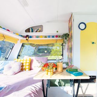 Caravan makeover with bed area and folding table