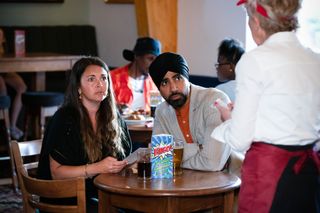 Stacey Slater and Kheerat Panesar are served by Jean Slater in the restaurant