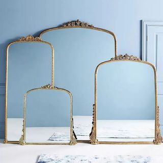 Set of 4 vintage mirrors on a blue background