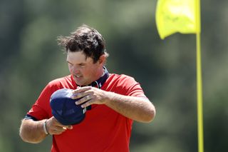 Patrick Reed battling wind at Augusta National golf club