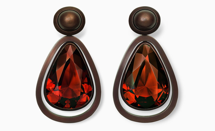 Earrings in brown-patinated copper and white