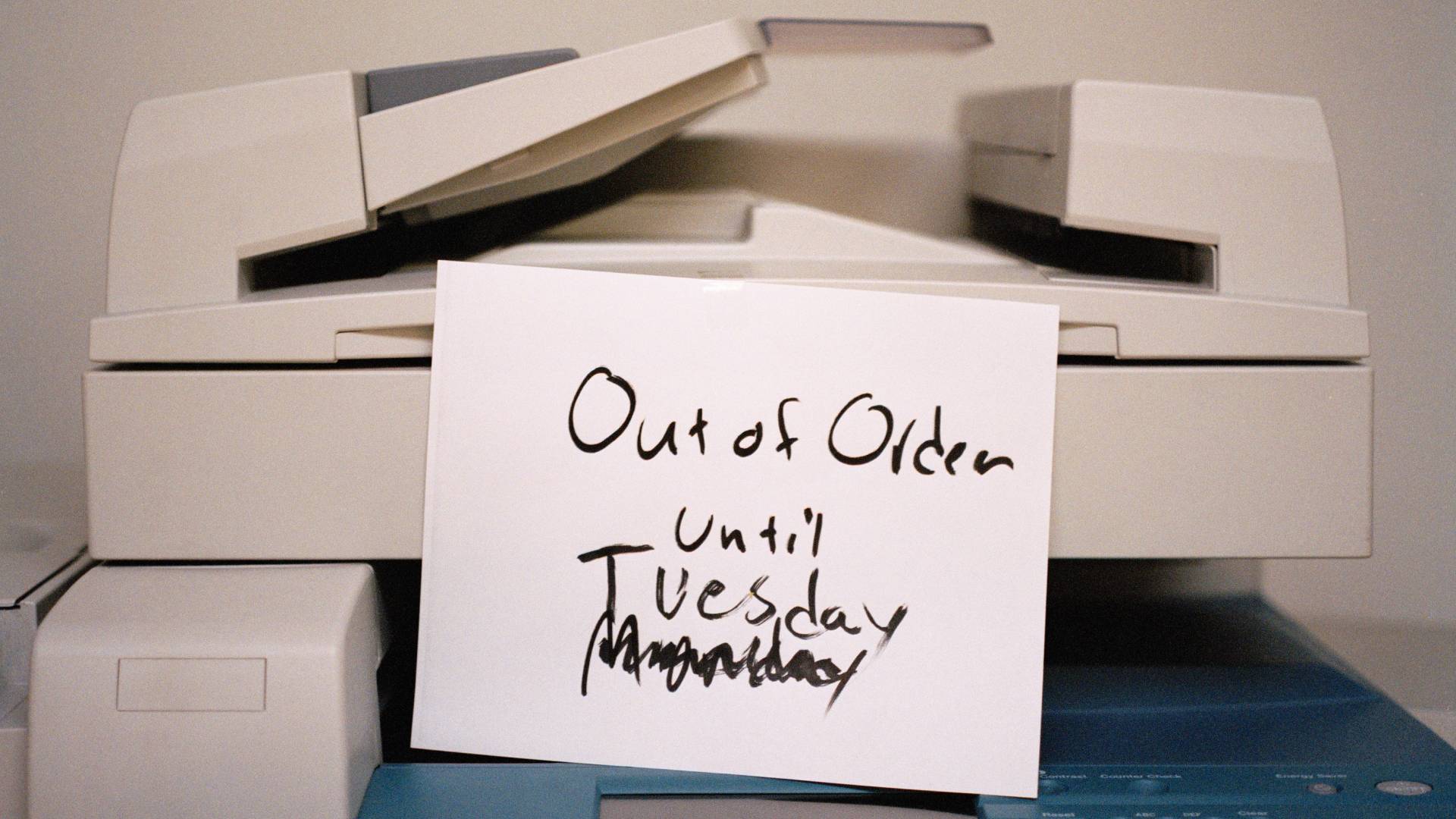 Photocopier and out of order sign - stock photo