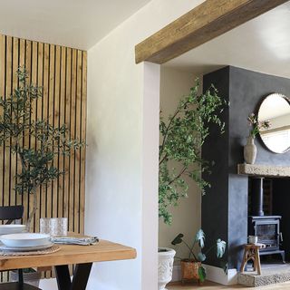 through living room with wooden beam