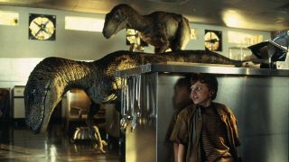 Scene from the movie Jurassic Park. Here we see two raptors searching a kitchen, whilst a child hides behind a counter.
