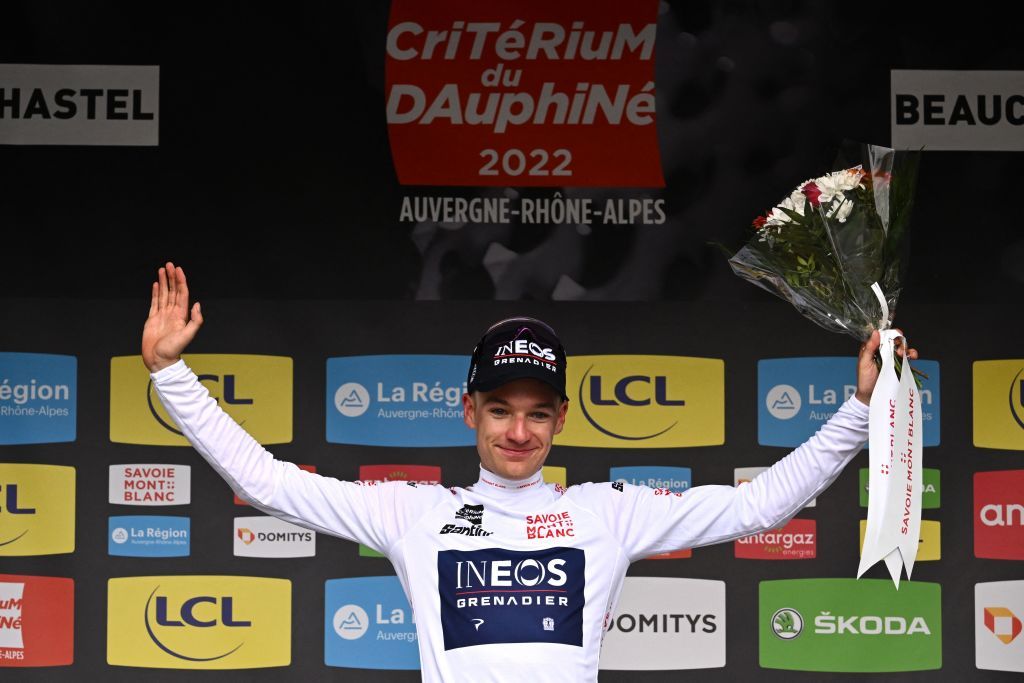 Ineos Grenadiers teams British rider Ethan Hayter celebrates his white jersey of best young on the podium at the end of the first stage of the 74th edition of the Criterium du Dauphine cycling race 192 km between La VoultesurRhone and Beauchastel on June 5 2022 cel Photo by Marco BERTORELLO AFP Photo by MARCO BERTORELLOAFP via Getty Images