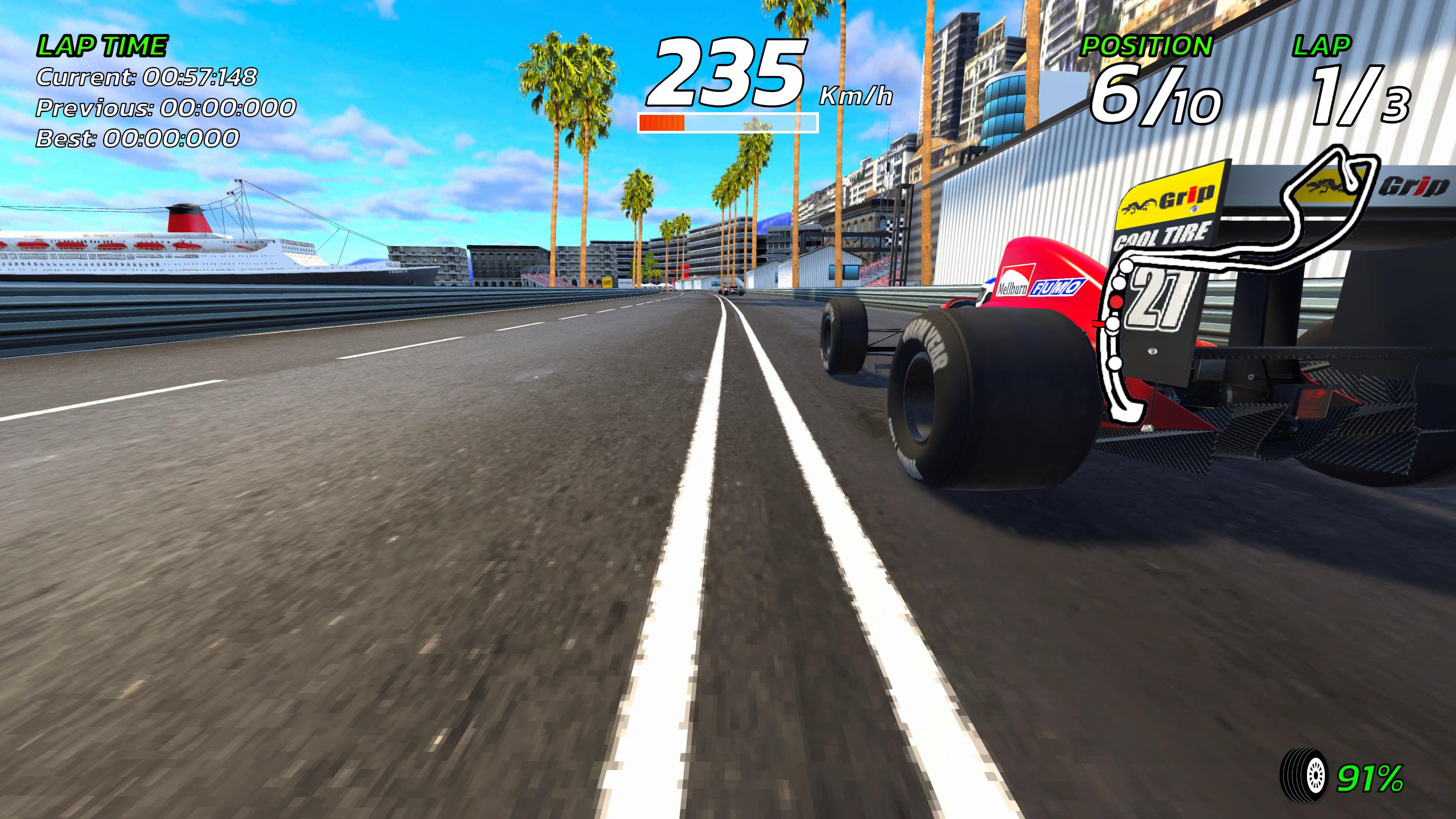 A low view of a racing track as an F1 car overtakes