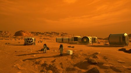 Artist's concept of astronauts and human habitats on Mars.