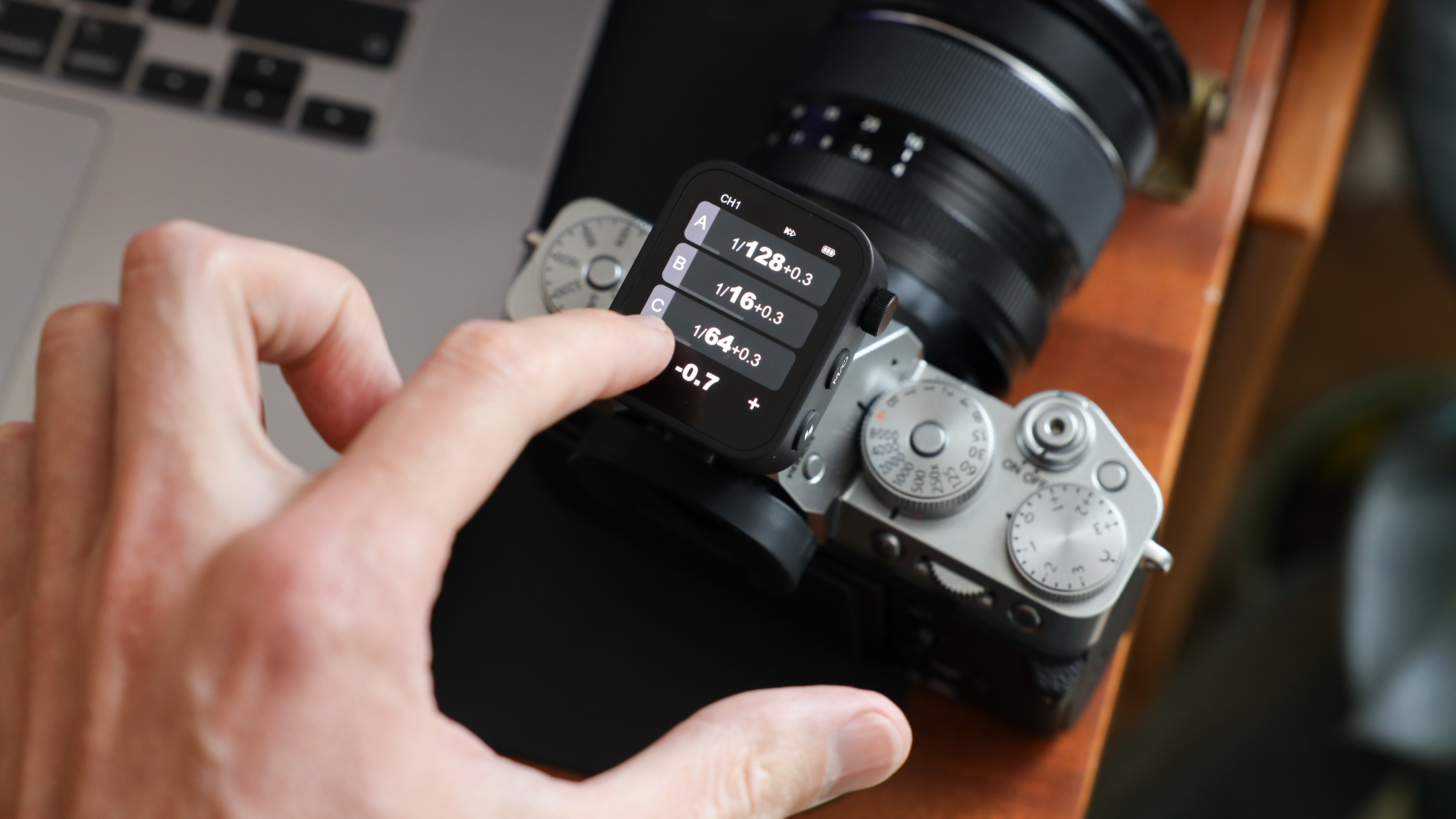 Godox X3 flash trigger mounted on a Fujifilm X-T5 camera