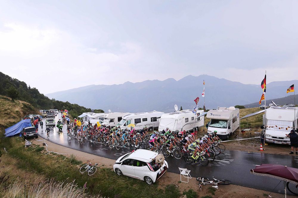 The peloton passes an apparently popular place to camp along the stage 12 route.