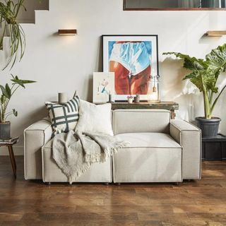 Neutral modular sofa in a neutral living room