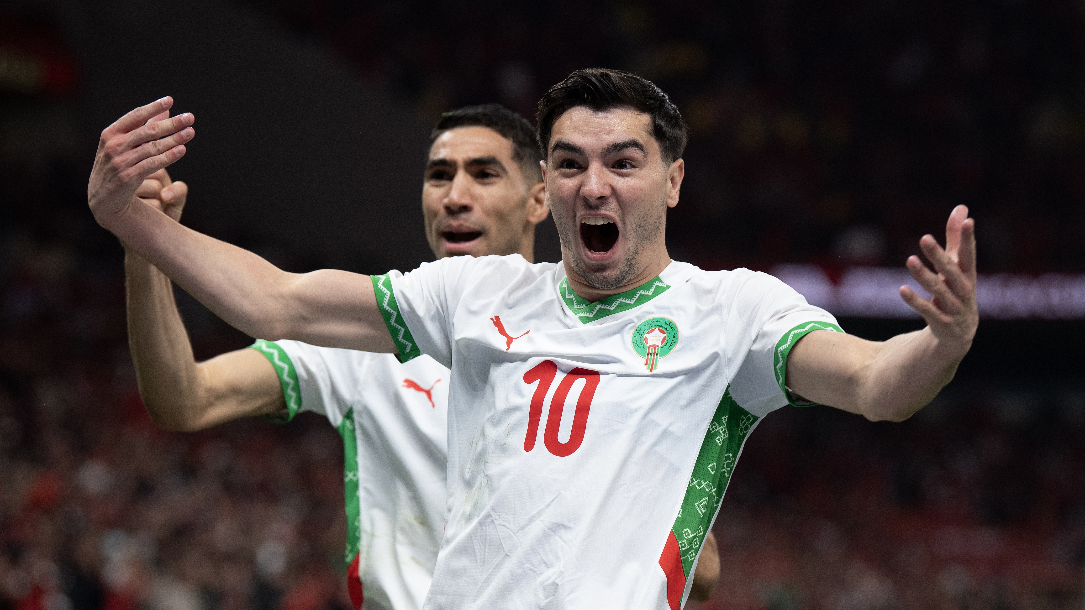 Brahim Diaz of Morocco (right) celebrates scoring the opening goal with Achraf Hakimi during the Africa Cup Of Nations Quarter-final match between Cameroon and Morocco at Prince Moulay Abdellah Stadium on January 9, 2026 in Rabat, Morocco. 