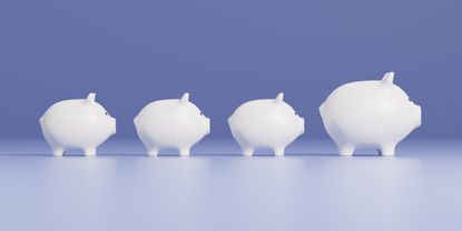 White piggy banks on a purple background