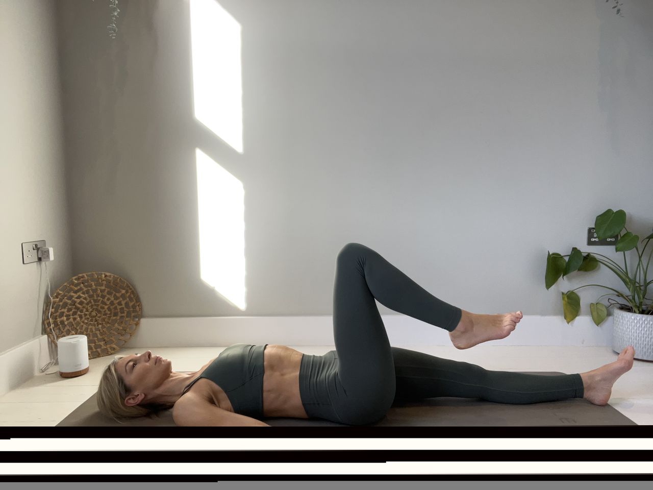 Pilates instructor Gemma Folkard demonstrating leg circles