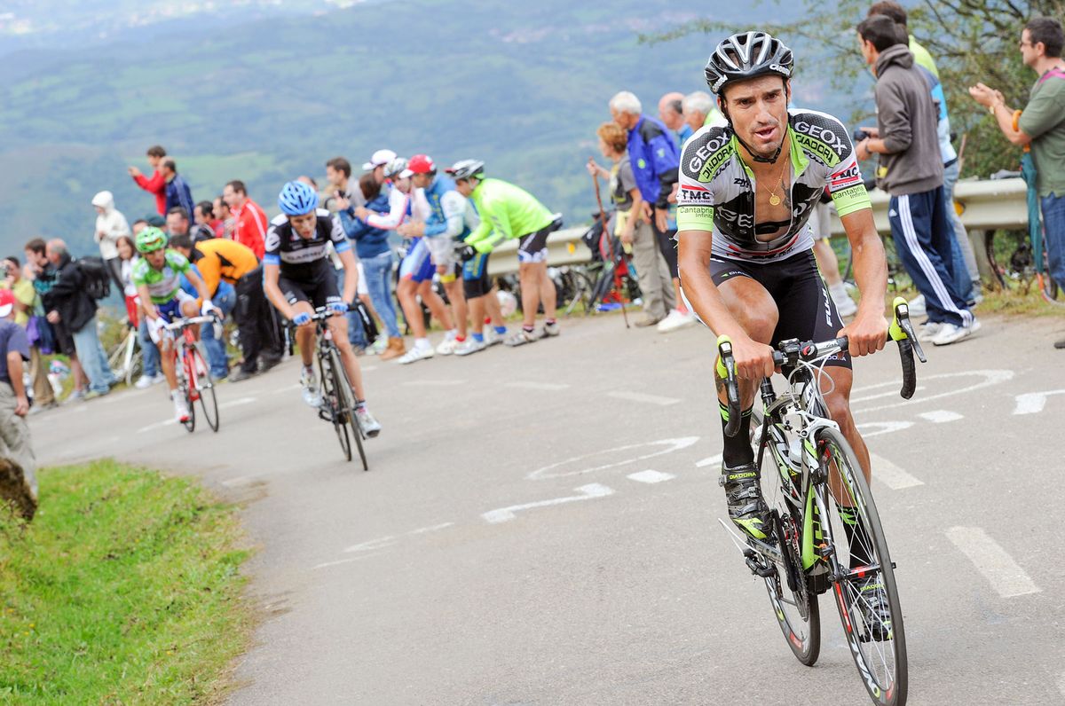 Cycling : 66th Tour of Spain 2011 / Stage 15
COBO Juan Jose (ESP)/ Daniel MARTIN (Irl)/ Joaquin RODRIGUEZ (Esp) Green Jersey /
Aviles - Alto de Angliru 1557m (142,2Km)/
La Vuelta / Ronde van Spanje / Tour d'Espagne /
Ronde / Rit Etape / (c)Tim De Waele