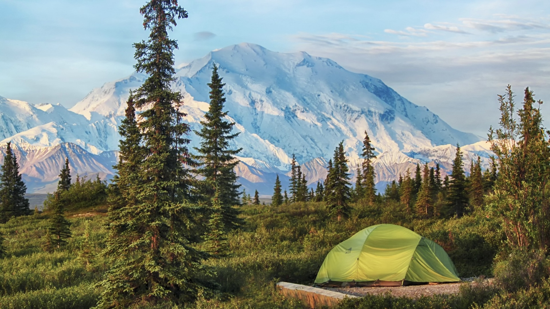 A tent pitched in view of a beautiful mountain