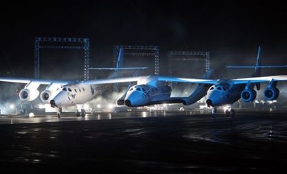 Virgin Galactic unveils its new SpaceShipTwo spacecraft in 2009. The ship has just completed its first flight, and is undergoing testing before it's allowed to take tourists into space. 