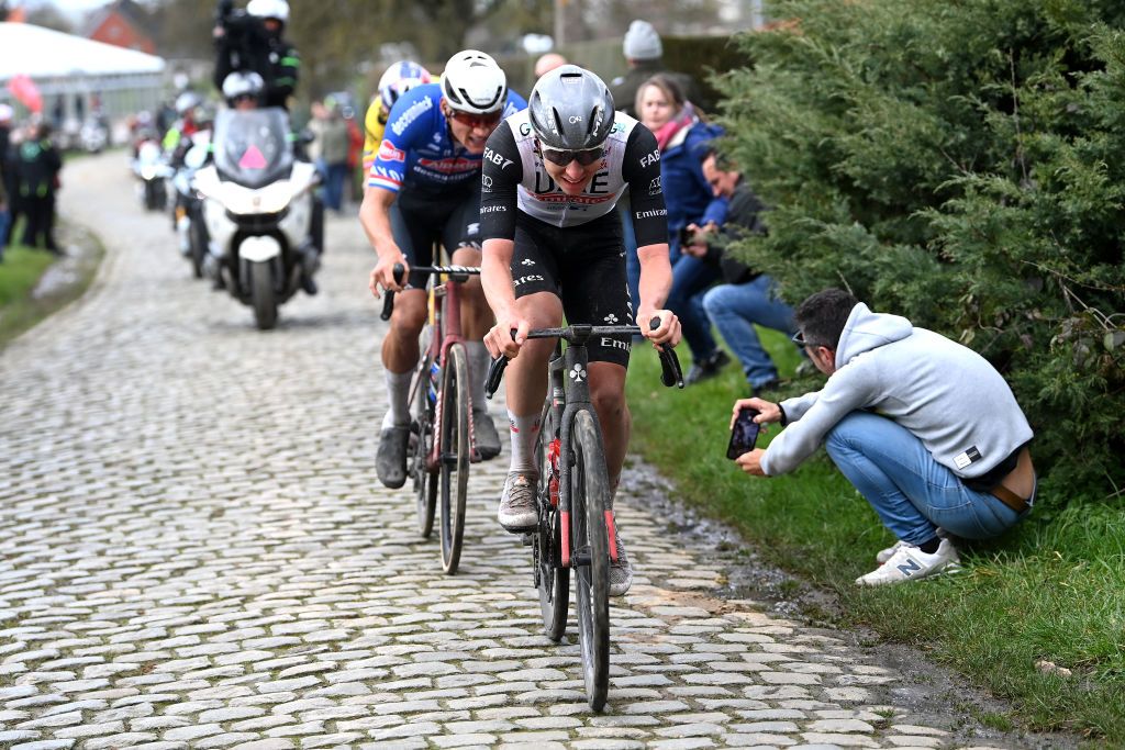 HARELBEKE BELGIUM MARCH 24 LR Mathieu Van Der Poel of The Netherlands and Team AlpecinDeceuninck and Tadej Pogaar of Slovenia and UAE Team Emirates compete in the breakaway during the 66th E3 Saxo Bank Classic Harelbeke 2023 a 2041km one day race from Harelbeke to Harelbeke on UCIWT March 24 2023 in Harelbeke Belgium Photo by Tim de WaeleGetty Images