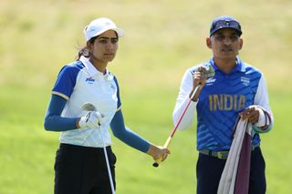 Diksha Dagar alongside her father and caddie Narinder at the Paris 2024 women's Olympic golf tournament