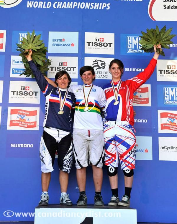 Elite women's downhill world championship podium: Emmeline Ragot (France), Morgane Charre (France), Manon Carpenter (Great Britain)
