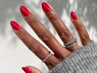 Woman with red nail polish