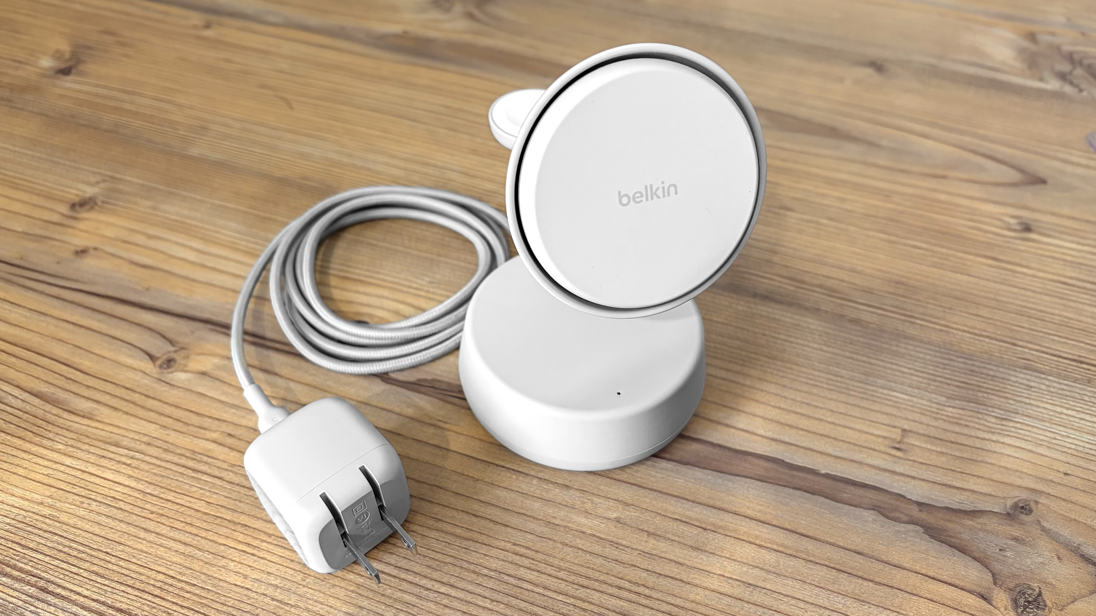 Belkin UltraCharge Pro 3-in-1 Magnetic Charging Dock with Qi2 25W on a wooden desk