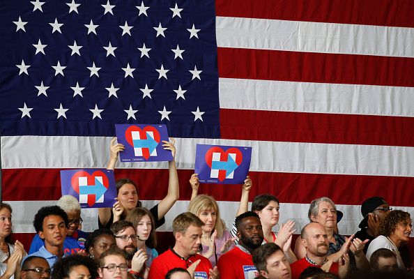 Bernie Sanders and Hillary Clinton appear together on the campaign trail. 