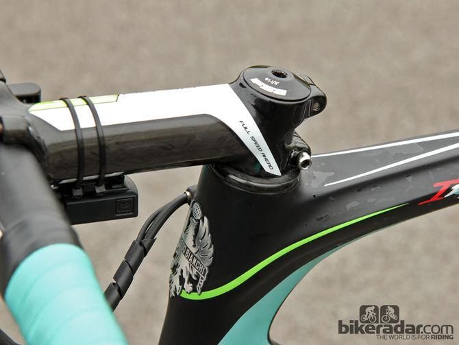 The carbon headset cover is shaved down to yield a few extra millimeters of handlebar drop