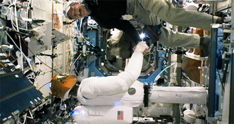 NASA robot Robonaut 2 shakes the hand of astronaut Daniel Burbank on Feb. 15, 2012, during the Expedition 30 mission. Robonaut 2 is the first humanoid robot ever to fly in space.