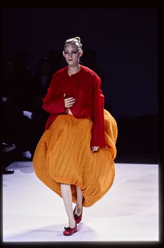 Model walks Comme des Garçons' RTW (pret a porter) Spring 1997 Runway collection,