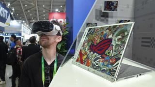 Jason England wearing the EmdoorVR AppleCore AX162 at Computex, with a shot of the Asus Project Dali being held on the right.