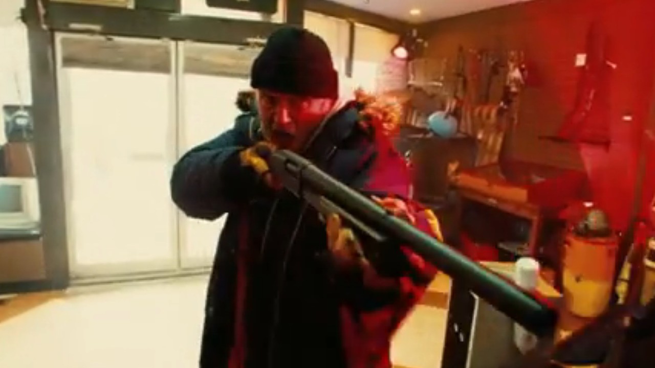 Rutger Hauer pointing a shotgun in Hobo With a Shotgun