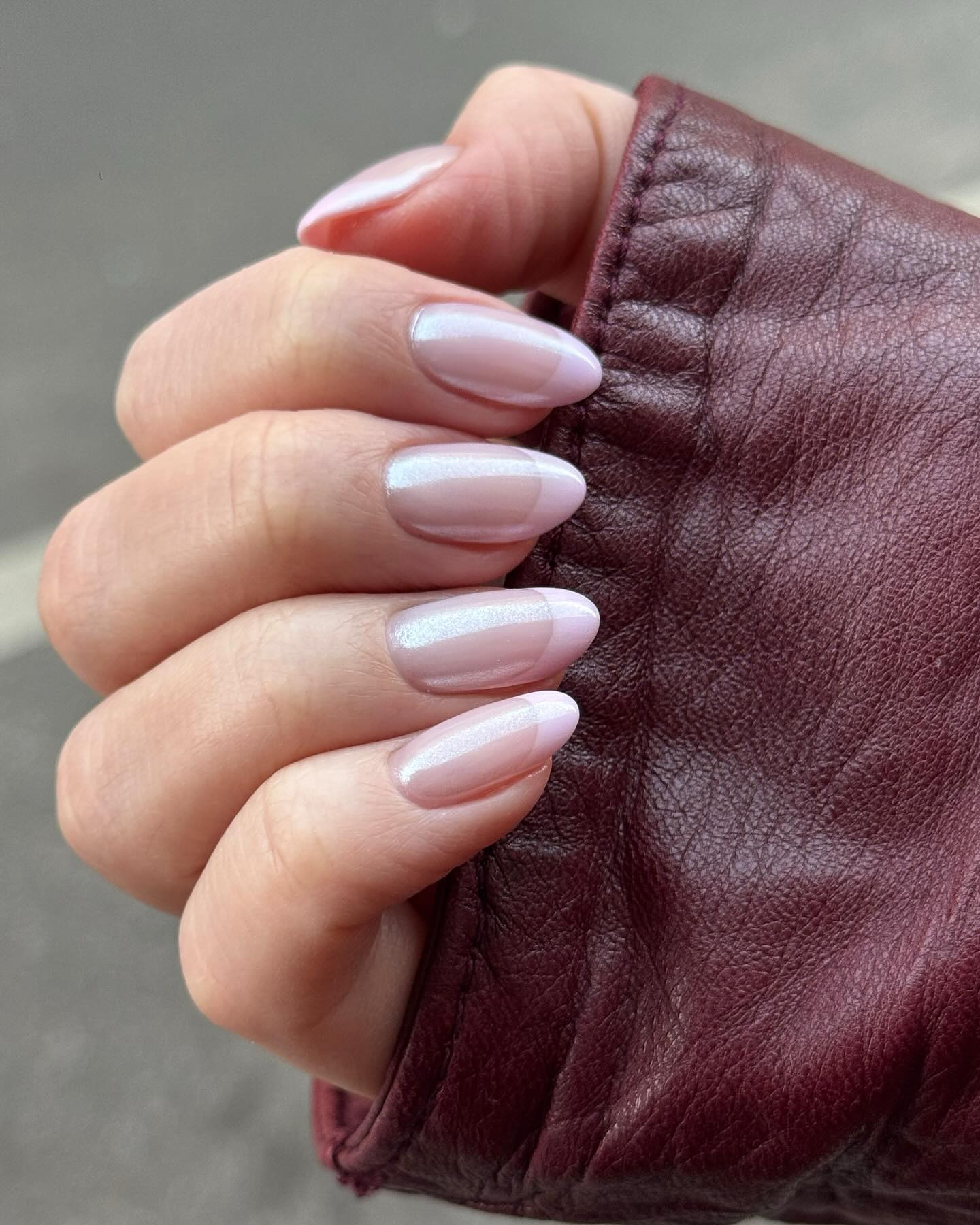 Pale pink French tip manicure.