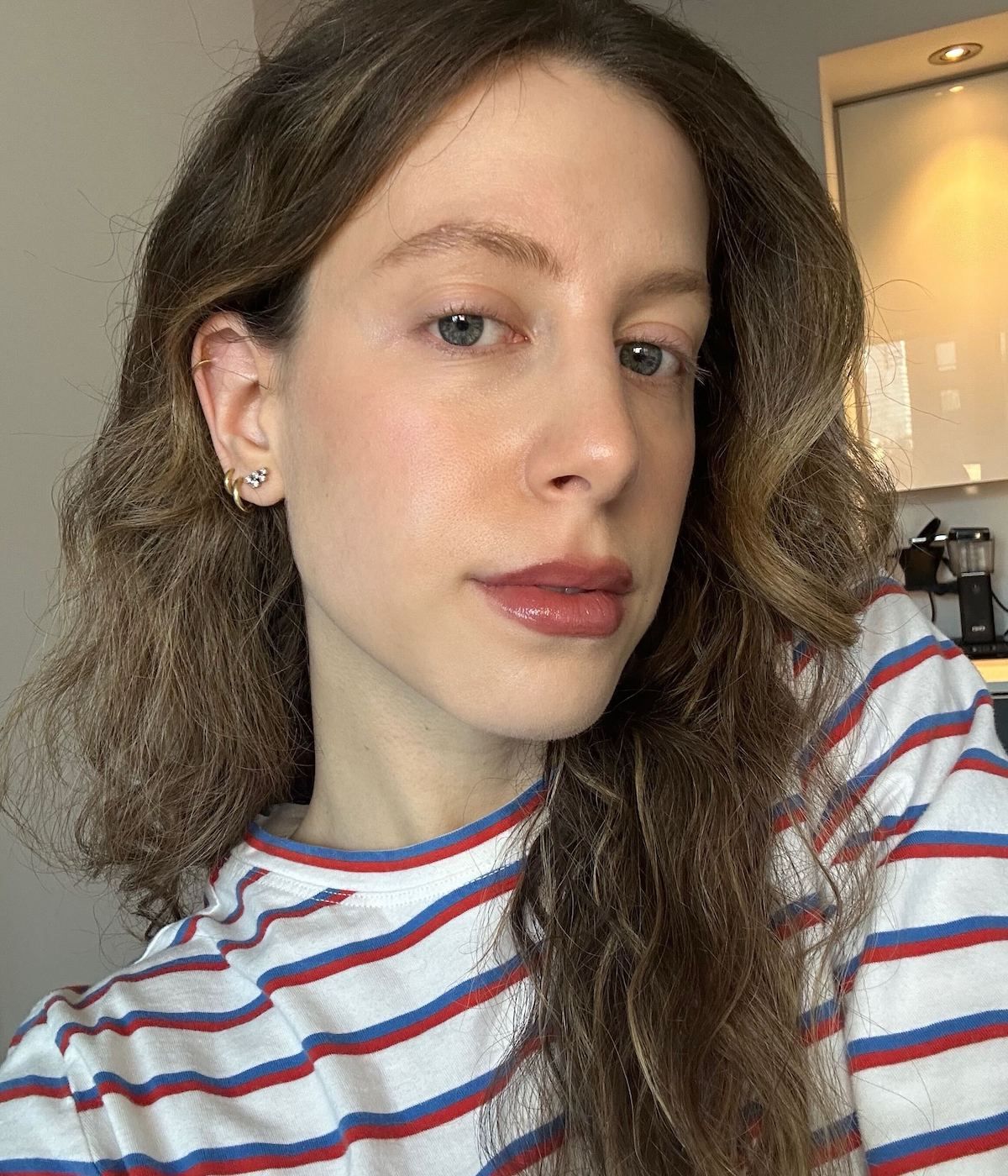 Senior beauty editor Jamie Schneider wearing Sacheu lip tint.