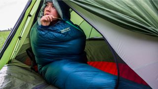 Woman inside Therm-a-Rest Hyperion 20F/-6C Sleeping Bag