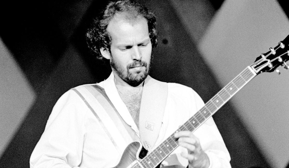 Lasse Wellander performs with ABBA at Wembley Arena in London on November 5, 1979