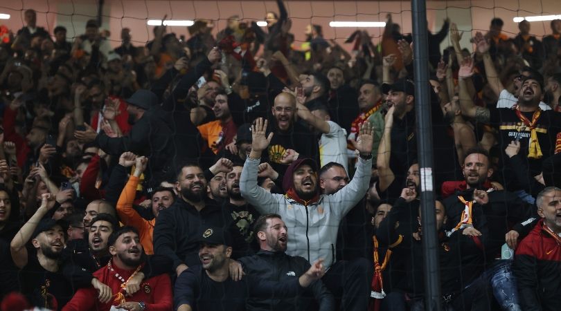 Galatasaray fans celebrate their team&#039;s win against Manchester United at Old Trafford in October 2023.