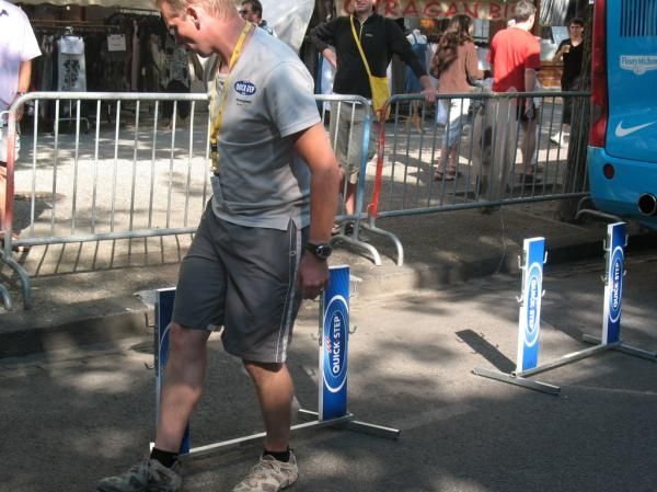 Placing the bike racks while awaiting the team cars