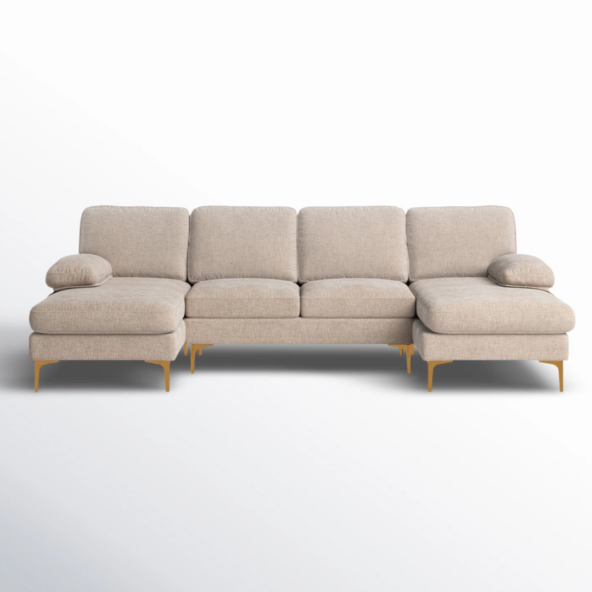 Cream sectional couch with gold legs