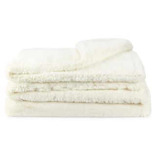 White faux fur throw blanket