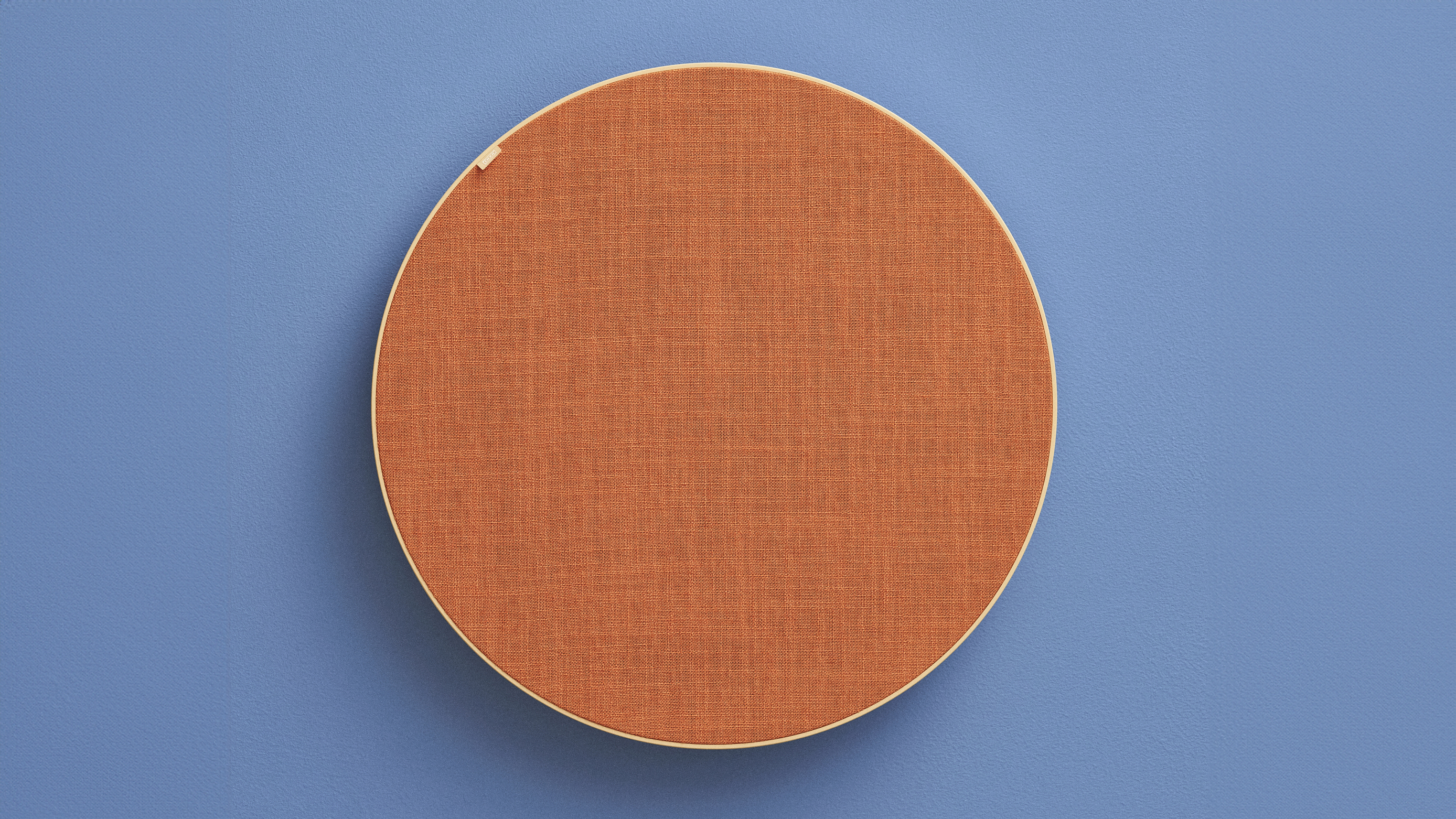 An IKEA SOLSKYDD Bluetooth speaker on a blue background