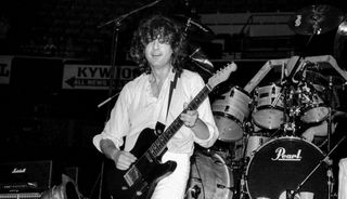 Jimmy Page performs onstage with the Firm at the Meadowlands Arena in East Rutherford, New Jersey on May 9, 1985