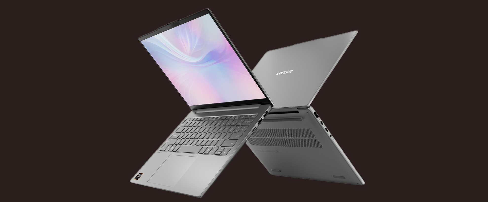 A cropped image of two Lenovo IdeaPad Slim 5 laptops opened up and back to back